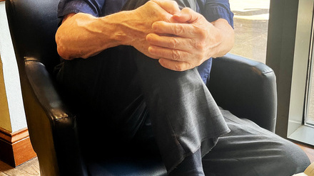 Jim Simpson shows off his new trainers.jpg