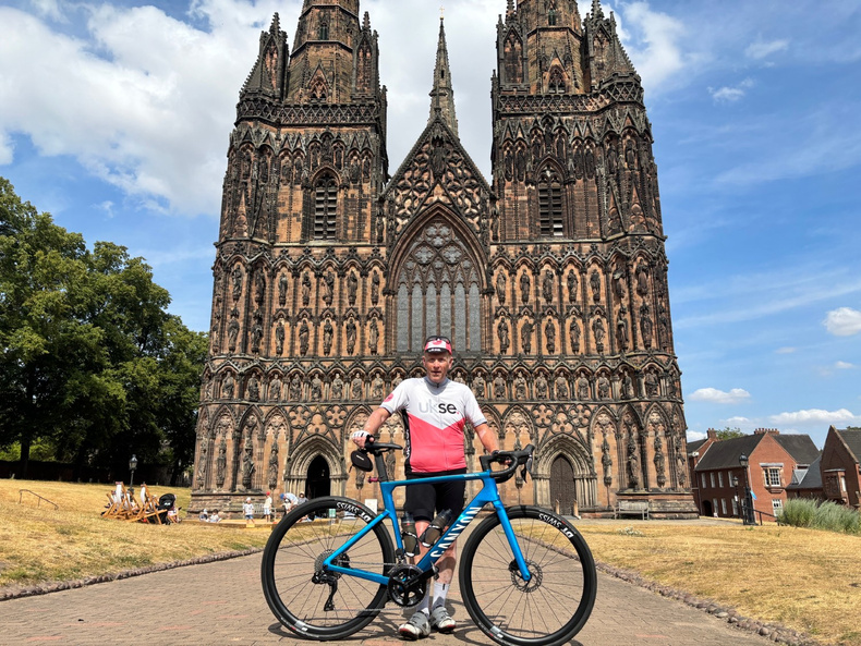 Steve Grice at Lichfield Cathedral on the return leg of his 200km challenge.jpg