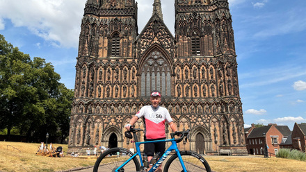 Steve Grice at Lichfield Cathedral on the return leg of his 200km challenge.jpg
