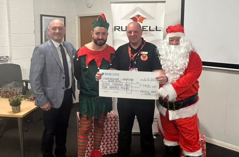 Andrew Hayward, MD and Russell Roof Tiles Handing Cheque to Phil Sutton from Shropshire Staffordshire and Cheshire Blood Bikes.JPG