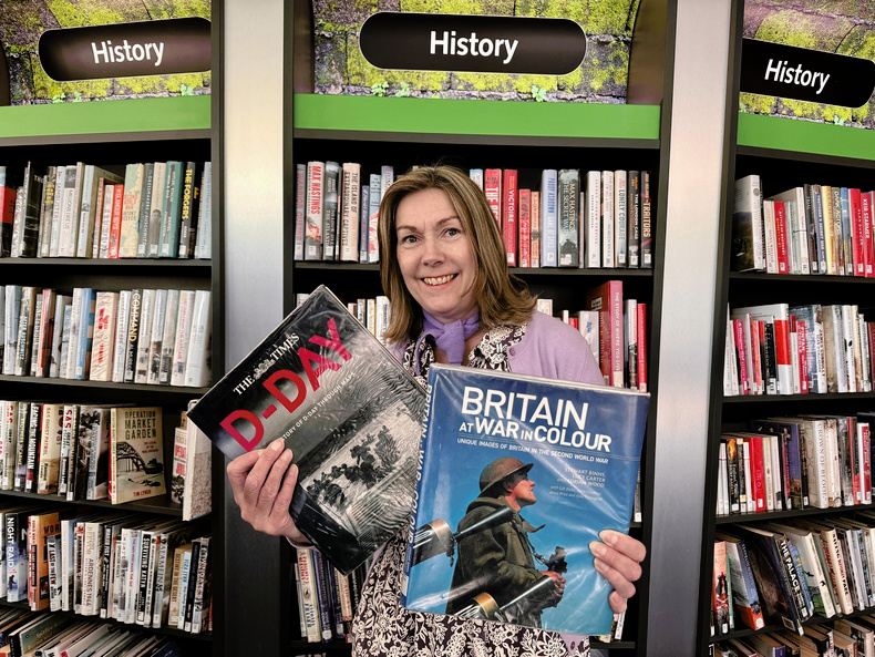 Sue Ball with history books.jpg