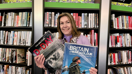 Sue Ball with history books.jpg