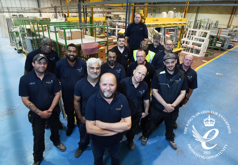howard-trotter-shelforce-business-manager-centre-with-members-of-the-shelforce-team(902674)