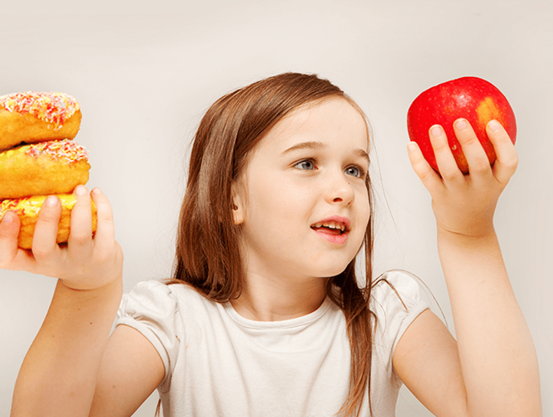 child-with-apple-and-dognut-rszjpg_0(892294)