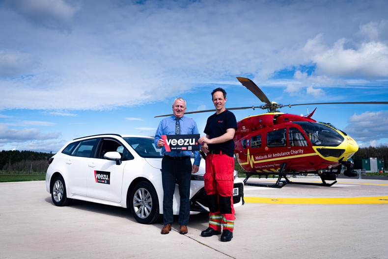 Graham Hoof pictured with a crew member from Midlands Air Ambulance Charity.jpg