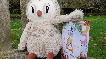 Arbie the Owl and his Explorer's Passport.jpg