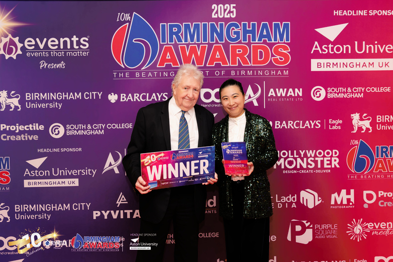 Jim Simpson and Sarah Yang with festival award.jpg