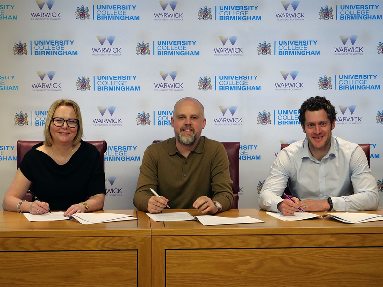 Into University Partnership Signing PR.png