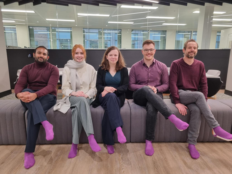 Crowe teams in purple socks 1.png