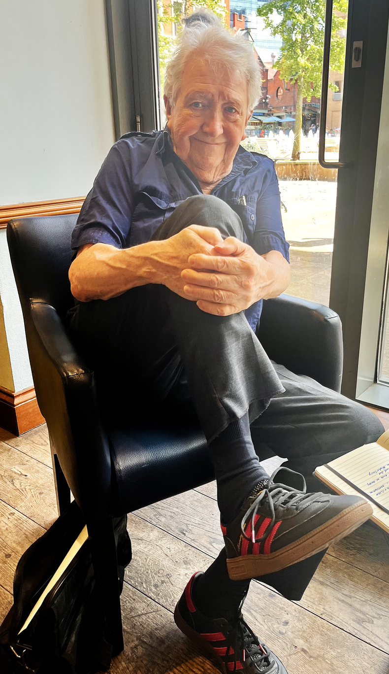 Jim Simpson shows off his new trainers.jpg