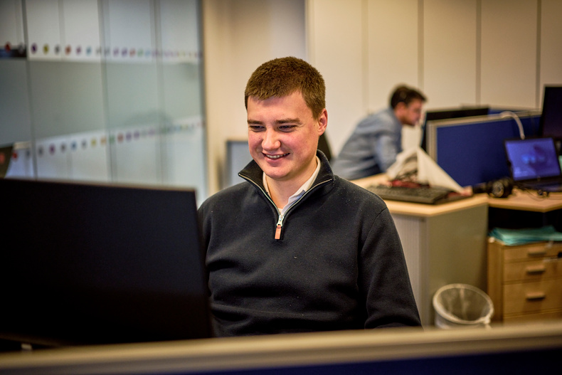 Joel+looking+%40+screen+smiling+5.jpg 1