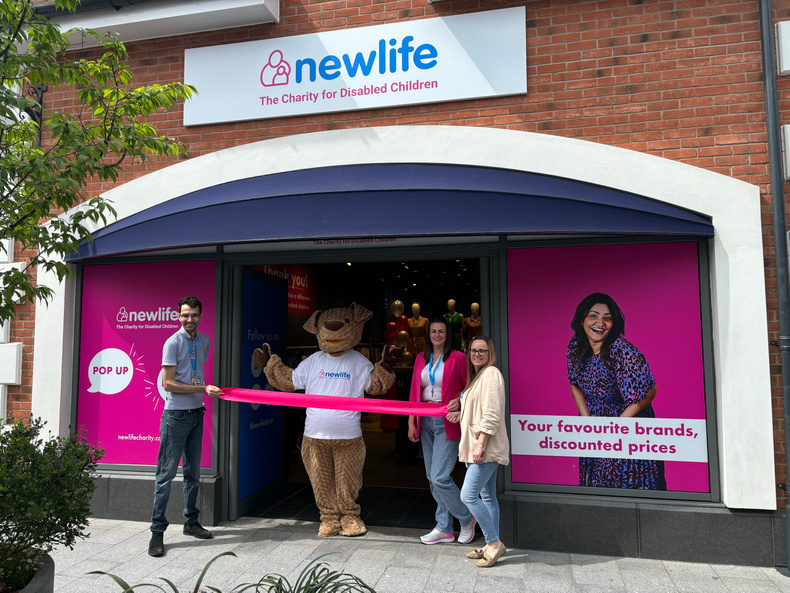 Pop-up opening at McArthurGlen West Midlands - pictured Newlife staff and Nugget the Newlife ambassadog.jpg